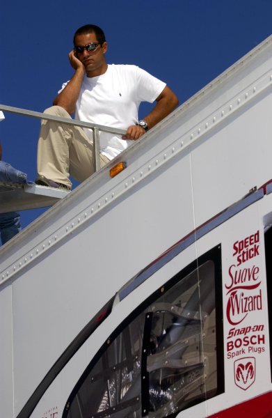 NASCAR Winton Cup Ford 400, Homestead-Miami Speedway, Homestead, Florida, USA 17 November,2002 
Formula One driver Juan Pablo Montoya hangs out among the transporters in the Winston Cup Garage.
Copyright-F
Peirce Williams/MMP-Inc. 2002 
LAT Photographic