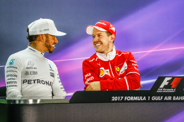 Bahrain International Circuit, Sakhir, Bahrain. 
Sunday 16 April 2017.
All smiles between Lewis Hamilton, Mercedes AMG, 2nd Position, and Sebastian Vettel, Ferrari, 1st Position, in the Press Conference.
World Copyright: Sam Bloxham/LAT Images
ref: Digital Image _W6I3401