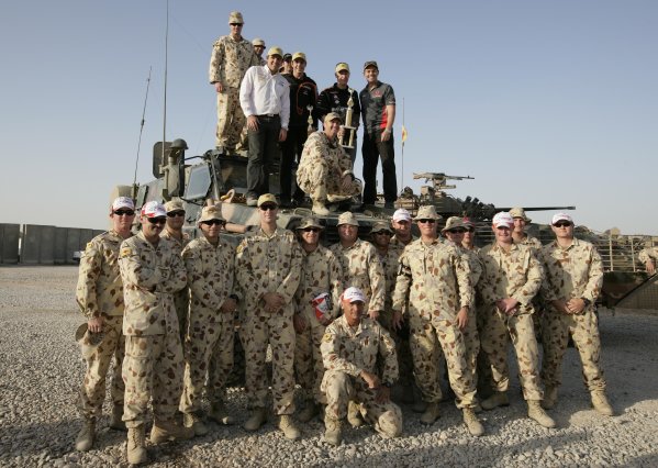 2007 Australian V8 Supercars.
Bahrain International Circuit. Sakhir, Bahrain.
2nd - 4th November.
Craig Lowndes, Jason Bright, Rick Kelly,Greg Murphy with Australian troops based at Tallil Airbase located approximately 310 kilometers Southeast of Baghdad, Iraq.
World Copyright: Mark Horsburgh/LAT Photographic.
Ref: Digital Image V8-Drivers-IRAQ-7512 2007 Australian V8 Supercars.
Bahrain International Circuit. Sakhir, Bahrain.
2nd - 4th November.
Craig Lowndes, Jason Bright, Rick Kelly,Greg Murphy with Australian troops based at Tallil Airbase located approximately 310 kilometers Southeast of Baghdad, Iraq.
World Copyright: Mark Horsburgh/LAT Photographic.
Ref: Digital Image V8-Drivers-IRAQ-7512