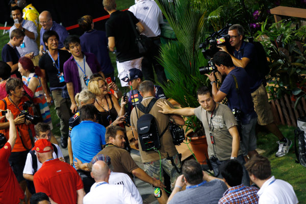 Marina Bay Circuit, Singapore.
Saturday 21st September 2013.
Sebastian Vettel, Red Bull Racing walks in teh paddock in a crowd of media.
World Copyright: Charles Coates/LAT Photographic.
ref: Digital Image _N7T5513 Marina Bay Circuit, Singapore.
Saturday 21st September 2013.
Sebastian Vettel, Red Bull Racing walks in teh paddock in a crowd of media.
World Copyright: Charles Coates/LAT Photographic.
ref: Digital Image _N7T5513