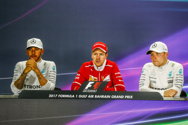 Bahrain International Circuit, Sakhir, Bahrain. 
Sunday 16 April 2017.
Lewis Hamilton, Mercedes AMG, 2nd Position, Sebastian Vettel, Ferrari, 1st Position, and Valtteri Bottas, Mercedes AMG, 3rd Position, in the Press Conference.
World Copyright: Sam Bloxham/LAT Images
ref: Digital Image _W6I3359