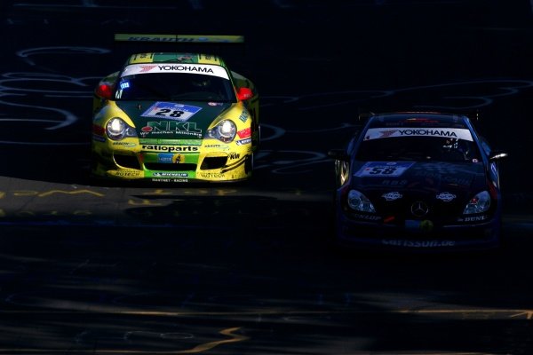 Lucas Luhr (GER) / Timo Bernhard (GER) / Mike Rockenfeller (GER) / Marcel Tiemann (MON) Manthey Racing Porsche 996 GT3-MR passes Rainer Bruckner (GER) / Ingvar Carlsson (GER) / Wolfgang Kaufmann (GER) / Frank Diefenbacher (GER) Carlsson Racing Mercedes SLK 350.
Nurburgring 24 Hour Race, Nurburgring, Germany 17-18 June 2006
DIGITAL IMAGE Lucas Luhr (GER) / Timo Bernhard (GER) / Mike Rockenfeller (GER) / Marcel Tiemann (MON) Manthey Racing Porsche 996 GT3-MR passes Rainer Bruckner (GER) / Ingvar Carlsson (GER) / Wolfgang Kaufmann (GER) / Frank Diefenbacher (GER) Carlsson Racing Mercedes SLK 350.
Nurburgring 24 Hour Race, Nurburgring, Germany 17-18 June 2006
DIGITAL IMAGE