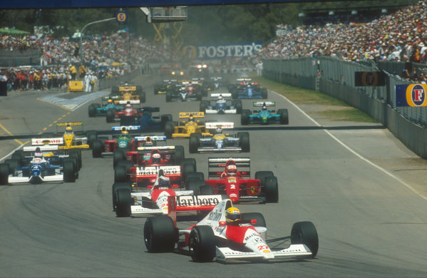 1990 Australian Grand Prix.
Adelaide, Australia.
2-4 November 1990.
Ayrton Senna leads teammate Gerhard Berger (both McLaren MP4/5B Honda's), Nigel Mansell, Alain Prost (both Ferrari 641's), Jean Alesi (Tyrrell 019 Ford), Nelson Piquet (Benetton B190 Ford), Riccardo Patrese (Williams FW13B Renault), Roberto Moreno (Benetton B190 Ford), Thierry Boutsen (Williams FW13B Renault), Pierluigi Martini (Minardi M190 Ford) and Derek Warwick (Lotus 102 Lamborghini) at the start.
Ref-90 AUS 02.
World Copyright - LAT Photographic
1990 Australian Grand Prix.
Adelaide, Australia.
2-4 November 1990.
Ayrton Senna leads teammate Gerhard Berger (both McLaren MP4/5B Honda's), Nigel Mansell, Alain Prost (both Ferrari 641's), Jean Alesi (Tyrrell 019 Ford), Nelson Piquet (Benetton B190 Ford), Riccardo Patrese (Williams FW13B Renault), Roberto Moreno (Benetton B190 Ford), Thierry Boutsen (Williams FW13B Renault), Pierluigi Martini (Minardi M190 Ford) and Derek Warwick (Lotus 102 Lamborghini) at the start.
Ref-90 AUS 02.
World Copyright - LAT Photographic