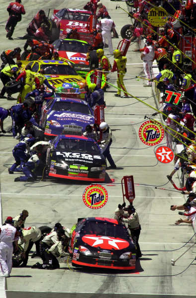 Headed by the car of Ricky Rudd, the crews service their cars during the first round of pitstops.
NAPA Auto Parts 500 at California Speedway, Fontana, California, USA, 30 April,2000.
-F
Peirce Williams 2000 LAT PHOTOGRAPHIC USA Headed by the car of Ricky Rudd, the crews service their cars during the first round of pitstops.
NAPA Auto Parts 500 at California Speedway, Fontana, California, USA, 30 April,2000.
-F
Peirce Williams 2000 LAT PHOTOGRAPHIC USA
