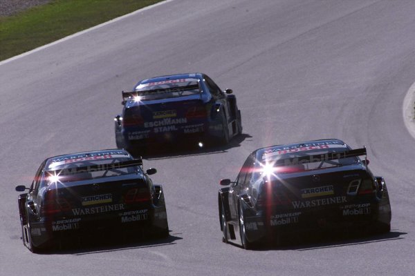 2001 DTM Championship
A1 Ring, Austria. 8th - 9th September 2001.
The Eschmann Mercedes Benz CLK of Patrick Huismann, leads the two AMG Mercedes Benz CLK's of Uwe Alzen and Marcel Fassler.
World Copyright: G. & H. M-ller/ASA?LAT Photographic
ref: Digital Image Only



