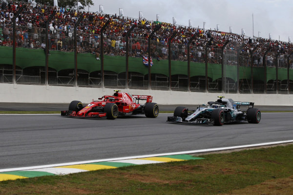 Kimi Raikkonen, Ferrari SF71H and Valtteri Bottas, Mercedes-AMG F1 W09 EQ Power+ battle