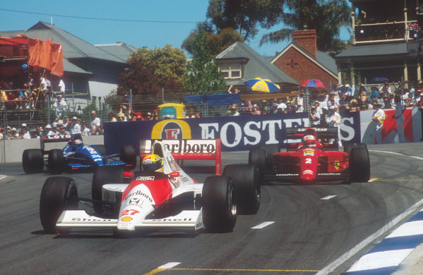 1990 Australian Grand Prix.
Adelaide, Australia.
2-4 November 1990.
Ayrton Senna (McLaren MP4/5B Honda) leads Nigel Mansell (Ferrari 641). Philippe Alliot (Ligier JS33B Ford) just behind, action.
World Copyright: LAT Photographic.
Ref: 90 AUS 10.
1990 Australian Grand Prix.
Adelaide, Australia.
2-4 November 1990.
Ayrton Senna (McLaren MP4/5B Honda) leads Nigel Mansell (Ferrari 641). Philippe Alliot (Ligier JS33B Ford) just behind, action.
World Copyright: LAT Photographic.
Ref: 90 AUS 10.