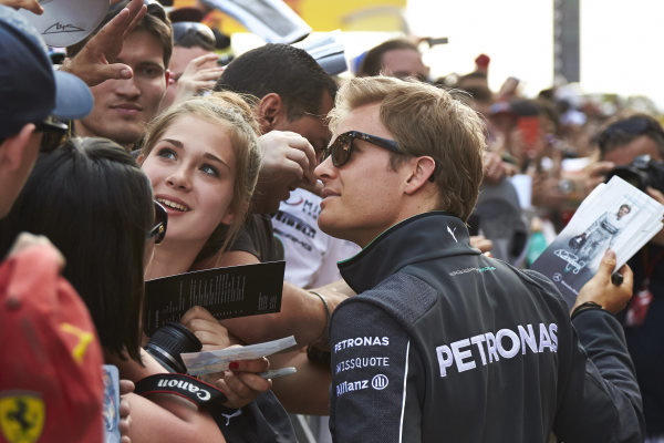 Circuit de Catalunya, Barcelona, Spain.
Thursday 8 May 2014.
Nico Rosberg, Mercedes AMG, signs autographs for fans.
World Copyright: Steve EtheringtonLAT Photographic.
ref: Digital Image SNE22279 copy Circuit de Catalunya, Barcelona, Spain.
Thursday 8 May 2014.
Nico Rosberg, Mercedes AMG, signs autographs for fans.
World Copyright: Steve EtheringtonLAT Photographic.
ref: Digital Image SNE22279 copy