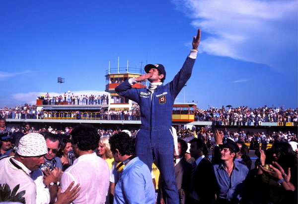 Jody Scheckter (RSA) celebrates a historic victory in the opening race of the season, as the Wolf team he drove for became the first and only constructor to win on their GP debut.
Argentinean Grand Prix, Rd1, Buenos Aires No. 15, Argentina, 9 January 1977.
BEST IMAGE
Jody Scheckter (RSA) celebrates a historic victory in the opening race of the season, as the Wolf team he drove for became the first and only constructor to win on their GP debut.
Argentinean Grand Prix, Rd1, Buenos Aires No. 15, Argentina, 9 January 1977.
BEST IMAGE