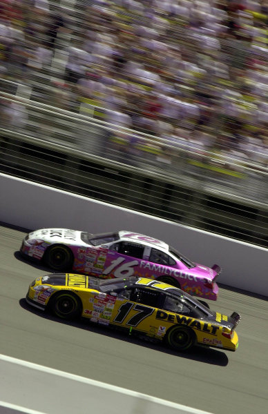 Rookie Matt Kenseth (17) laps the car of Kevin LePage while leading the race. Kenseth fell to 8th after a slow late race pitstop, but rebounded to finish third.
NAPA Auto Parts 500 at California Speedway, Fontana, California, USA, 30 April,2000.
-F
Peirce Williams 2000 LAT PHOTOGRAPHIC USA