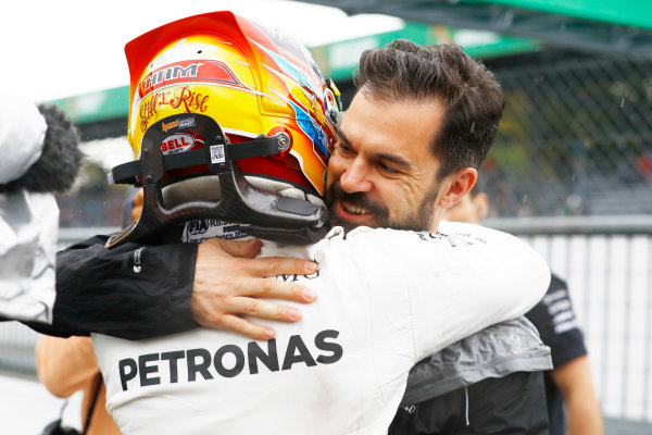 Autodromo Nazionale di Monza, Italy.
Saturday 02 September 2017.
Lewis Hamilton, Mercedes AMG, celebrates with Marc Hynes after taking his 69th F1 Pole Position.
World Copyright: Steven Tee/LAT Images 
ref: Digital Image _O3I6439