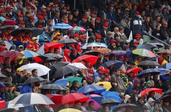 DTM Championship 2002, Round 10 - Hockenheimring, Germany, 6 October 2002 - Rain in the final stages of the main race brought extra tactics into play allowing Bernd Schneider (Vodafone AMG-Mercedes) to take over the lead from Laurent Aiello (Team Abt Sportsline).