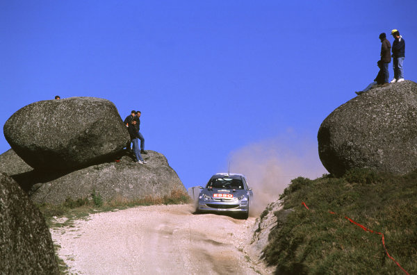 FIA World Rally Championship
Portuguese Rally, Porto, Portugal.
16-19th March 2000.
Marcus Gronholm and Timo Rautianen (Peugeot) action.
World - LAT Photographic
Tel: +44 (0) 181 251 3000
Fax: +44 (0) 181 251 3001
e-mail: latdig@dial.pipex
com
FIA World Rally Championship
Portuguese Rally, Porto, Portugal.
16-19th March 2000.
Marcus Gronholm and Timo Rautianen (Peugeot) action.
World - LAT Photographic
Tel: +44 (0) 181 251 3000
Fax: +44 (0) 181 251 3001
e-mail: latdig@dial.pipex
com