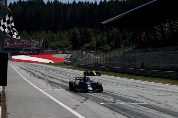 Race winner Sergio Sette Camara (BRA, DAMS) crosses the finish line followed by Luca Ghiotto (ITA, UNI VIRTUOSI)