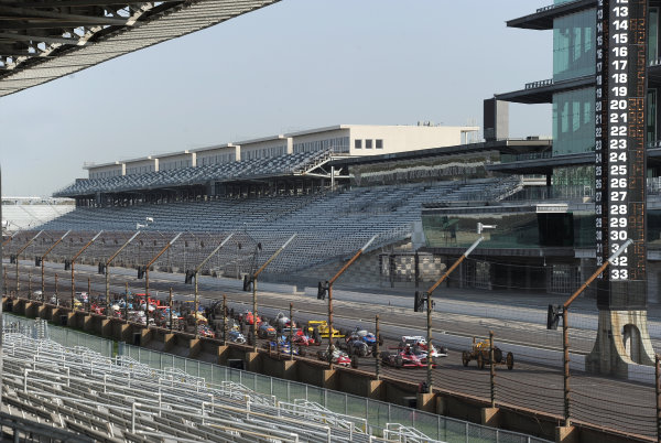 12 October, 2010, Indianapolis, Indiana, USA
33 Historic cars representing the 100 year history of the Indy 500 are gathered on the grid of the Indianapolis Motor Speedway
©2010, Dan R. Boyd, USA
LAT Photographic 12 October, 2010, Indianapolis, Indiana, USA
33 Historic cars representing the 100 year history of the Indy 500 are gathered on the grid of the Indianapolis Motor Speedway
©2010, Dan R. Boyd, USA
LAT Photographic