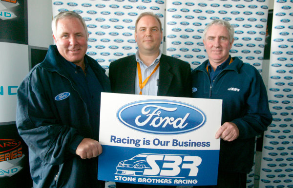 2003 Australian V8 Supercars
Oran Park, Sydney, Australia. 17th August 2003.
Ford today anounced a new 5 year deal with Stone Brothers Racing. SBR bosses Ross(left) and Jimmy with FORD Motorsport Stephen Kruk (centre)
World Copyright: Mark Horsburgh/LAT Photographic
ref: Digital Image Only 2003 Australian V8 Supercars
Oran Park, Sydney, Australia. 17th August 2003.
Ford today anounced a new 5 year deal with Stone Brothers Racing. SBR bosses Ross(left) and Jimmy with FORD Motorsport Stephen Kruk (centre)
World Copyright: Mark Horsburgh/LAT Photographic
ref: Digital Image Only