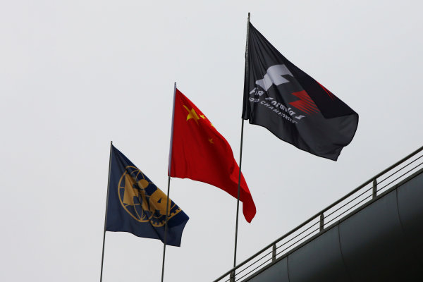 Shanghai International Circuit, Shanghai, China. 
Sunday 09 April 2017.
The FIA, Chinese and Formula 1 flags on display over the Shanghai International Circuit.
World Copyright: Andy Hone/LAT Images
ref: Digital Image _ONZ5488