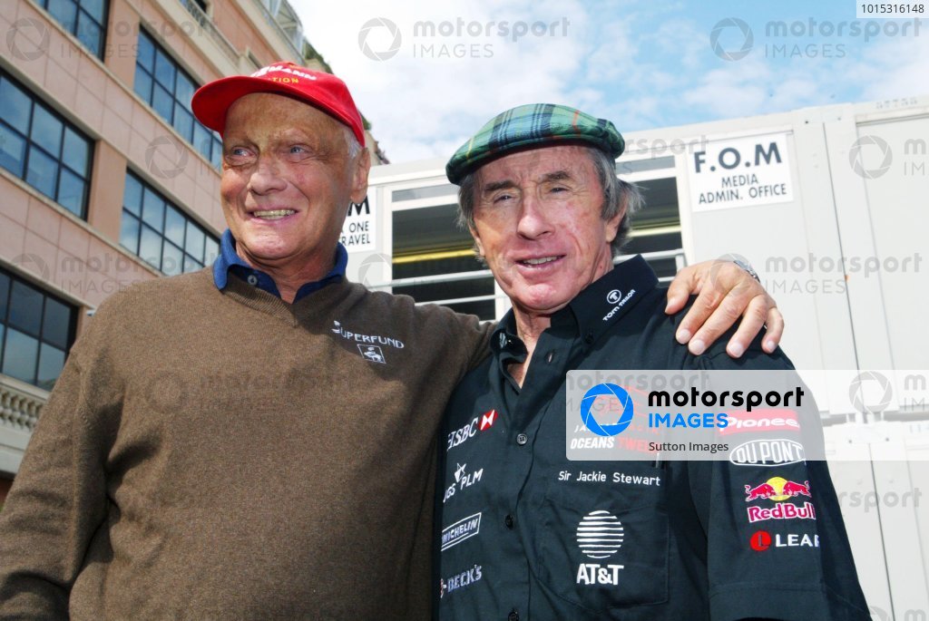 (L to R): Niki Lauda (AUT) with Jackie Stewart (GBR). Formula One World