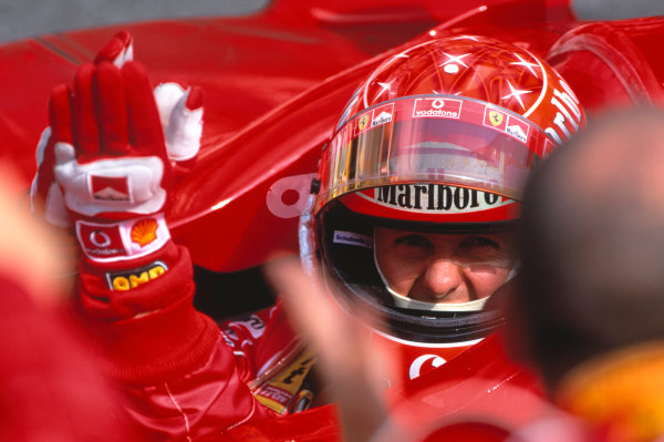 2004 German Grand Prix
Hockenheim, Germany. 23rd - 25th July.
Michael Schumacher, Ferrari F2004 celebrates his win in parc ferme.
World Copyright:Peter Spinney/LAT Photographic 
Ref:35mm Image:A20

