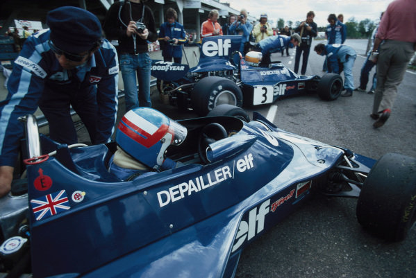 Patrick Depailler and team mate Jody Scheckter both sat in their Tyrrell 007 Fords waiting to go on track.