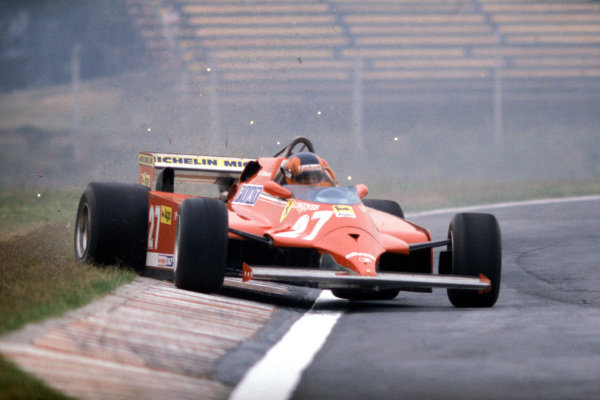 Gilles Villeneuve, Ferrari 126CK, corrects a slide as he runs wide onto the grass, kicking up sparks in the process. Gilles Villeneuve, Ferrari 126CK, corrects a slide as he runs wide onto the grass, kicking up sparks in the process.