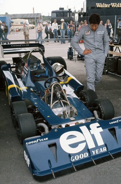 Anderstorp, Sweden. 11th - 13th June 1976.
Jody Scheckter (Tyrrell P34-Ford), 1st position, in the paddock looking over his car, portrait. 
World Copyright: LAT Photographic. 
Ref:  76 SWE 16.