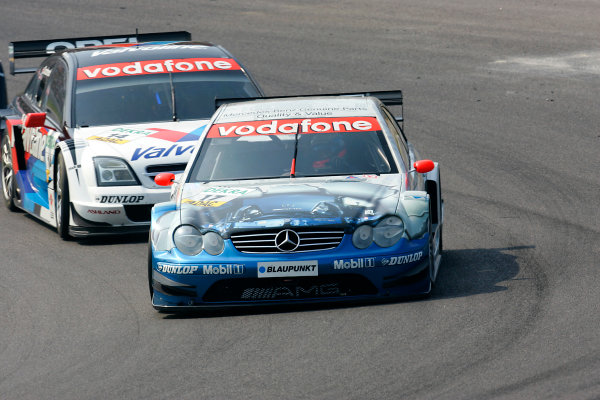 2004 DTM Championship
Zandvoort, Netherlands. 4th - 5th September.
Markus Winkelhock (Persson Motorsport Mercedes CLK) leads Peter Dumbreck (OPC Phoenix Opel Vectra GTS). Action.
World Copyright: Andre Irlmeier/LAT Photographic
ref: Digital Image Only