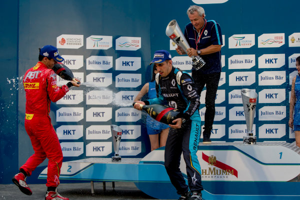 2016/2017 FIA Formula E Championship.
Hong Kong ePrix, Hong Kong, China.
Sunday 9 October 2016.
Lucas Di Grassi (BRA), ABT Schaeffler Audi Sport, Spark-Abt Sportsline, ABT Schaeffler FE02, Sebastien Buemi (SUI), Renault e.Dams, Spark-Renault, Renault Z.E 16 and Nick Heidfeld (GER), Mahindra Racing, Spark-Mahindra, Mahindra M3ELECTRO on the podium.
Photo: Zak Mauger/LAT/Formula E
ref: Digital Image _X0W2975 2016/2017 FIA Formula E Championship.
Hong Kong ePrix, Hong Kong, China.
Sunday 9 October 2016.
Lucas Di Grassi (BRA), ABT Schaeffler Audi Sport, Spark-Abt Sportsline, ABT Schaeffler FE02, Sebastien Buemi (SUI), Renault e.Dams, Spark-Renault, Renault Z.E 16 and Nick Heidfeld (GER), Mahindra Racing, Spark-Mahindra, Mahindra M3ELECTRO on the podium.
Photo: Zak Mauger/LAT/Formula E
ref: Digital Image _X0W2975