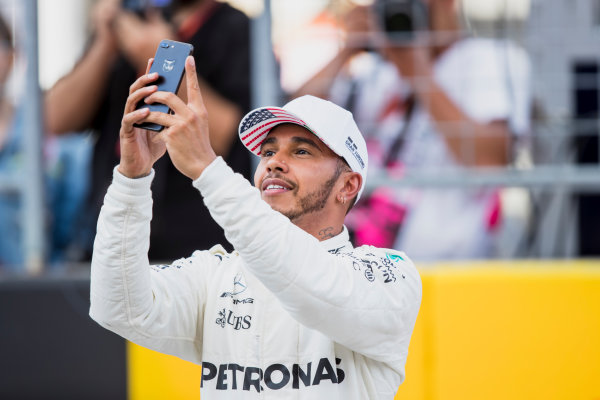 Circuit of the Americas, Austin, Texas, United States of America.
Saturday 21 October 2017.
Lewis Hamilton, Mercedes AMG, celebrates on the grid after securing pole.
World Copyright: Zak Mauger/LAT Images 
ref: Digital Image _56I1798