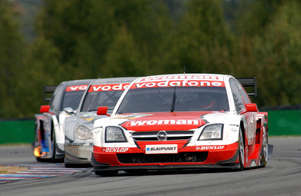 2004 DTM Championship
Brno,Czech Republic. 18th - 19th September.
Timo Scheider (OPC Holzer Opel Vectra GTS) leads Jean Alesi (HWA Mercedes C-Class) and Peter Dumbreck (OPC Phoenix Opel Vectra GTS). Action.
World Copyright: Andre Irlmeier/LAT Photographic
ref: Digital Image Only 2004 DTM Championship
Brno,Czech Republic. 18th - 19th September.
Timo Scheider (OPC Holzer Opel Vectra GTS) leads Jean Alesi (HWA Mercedes C-Class) and Peter Dumbreck (OPC Phoenix Opel Vectra GTS). Action.
World Copyright: Andre Irlmeier/LAT Photographic
ref: Digital Image Only