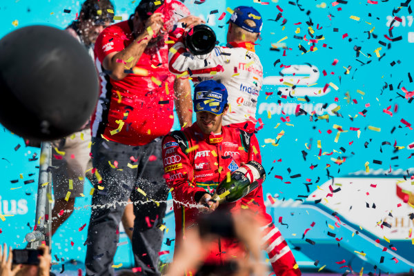 2016/2017 FIA Formula E Championship.
Round 7 - Berlin ePrix, Tempelhof Airport, Berlin, Germany.
Saturday 10 June 2017.
Lucas Di Grassi (BRA), ABT Schaeffler Audi Sport, Spark-Abt Sportsline, ABT Schaeffler FE02, sprays the champagne on the podium.
Photo: Zak Mauger/LAT/Formula E
ref: Digital Image _54I7723