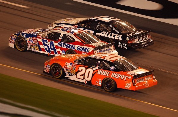 Three abreast as they approach the finish line (L to R): Fifteenth placed Tony Stewart (USA) Home Depot Pontiac; Todd Bodine (USA) Army National Guard Ford, who finished thirteenth; Ryan Newman (USA) ALLTEL Ford who finished fourth.
Budweiser Shootout, Daytona International Speedway, Florida, USA, 8 February 2003.
DIGITAL IMAGE
Three abreast as they approach the finish line (L to R): Fifteenth placed Tony Stewart (USA) Home Depot Pontiac; Todd Bodine (USA) Army National Guard Ford, who finished thirteenth; Ryan Newman (USA) ALLTEL Ford who finished fourth.
Budweiser Shootout, Daytona International Speedway, Florida, USA, 8 February 2003.
DIGITAL IMAGE
