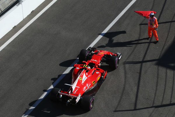 Sochi Autodrom, Sochi, Russia.
Friday 28 April 2017.
A marshal tries, unsuccessfully, to stop Kimi Raikkonen, Ferrari SF70H, from leaving the pit lane at the end of the session.
World Copyright: Coates/LAT Images
ref: Digital Image AN7T1172