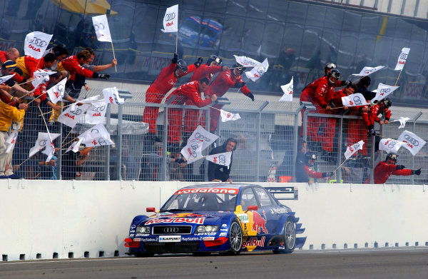 2004 DTM Championship 
Brno,Czech Republic. 18th - 19th September.
Winner Mattias Ekstrom (Abt Sportsline Audi A4) lights up his rear tyres as he crosses the line to the cheers of his team. Action
World Copyright: Andre Irlmeier/LAT Photographic 
ref: Digital Image Only