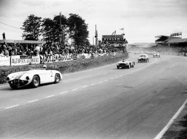 1953 Le Mans 24 hours.
Le Mans, France. 13-14 June 1953.
Phil Walters/John Fitch, Cunningham C5R-Chrysler, 3rd position leads Sydney Allard/Philip Fotheringham-Parker, Allard J2R-Cadillac, retired, at the start.
World Copyright: LAT Photographic
Ref: 53/53/26A-27 1953 Le Mans 24 hours.
Le Mans, France. 13-14 June 1953.
Phil Walters/John Fitch, Cunningham C5R-Chrysler, 3rd position leads Sydney Allard/Philip Fotheringham-Parker, Allard J2R-Cadillac, retired, at the start.
World Copyright: LAT Photographic
Ref: 53/53/26A-27