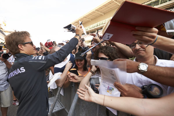 Circuit de Catalunya, Barcelona, Spain.
Thursday 8 May 2014.
Nico Rosberg, Mercedes AMG, signs autographs for fans.
World Copyright: Steve EtheringtonLAT Photographic.
ref: Digital Image SNE11639 copy