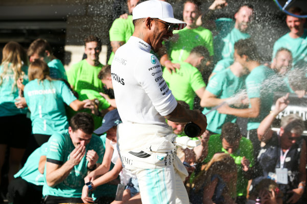 Circuit of the Americas, Austin, Texas, United States of America.
Sunday 22 October 2017.
Lewis Hamilton, Mercedes AMG, 1st Position, celebrates winning the race and the Constructors title, with his team.
World Copyright: Charles Coates/LAT Images
ref: Digital Image AN7T2417 Circuit of the Americas, Austin, Texas, United States of America.
Sunday 22 October 2017.
Lewis Hamilton, Mercedes AMG, 1st Position, celebrates winning the race and the Constructors title, with his team.
World Copyright: Charles Coates/LAT Images
ref: Digital Image AN7T2417