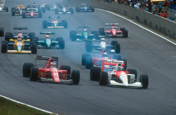 1991 Brazilian Grand Prix.
Interlagos, Sao Paulo, Brazil.
22-24 March 1991.
Gerhard Berger (McLaren MP4/6 Honda) followed by Jean Alesi and Alain Prost (Ferrari 642), Nelson Piquet (Benetton B190B Ford), Stefano Modena (Tyrrell 020 Honda), Mauricio Gugelmin (Leyton House CG911 Ilmor), Eric Bernard (Lola L91 Ford), Bertrand Gachot (Jordan 191 Ford) and Emanuele Pirro (Dallara 191 Judd) at the start.
Ref-91 BRA 11.
World Copyright - LAT Photographic

