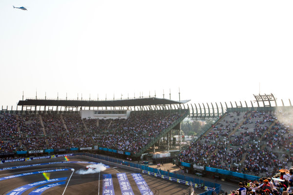 2015/2016 FIA Formula E Championship.
Mexico City ePrix, Autodromo Hermanos Rodriguez, Mexico City, Mexico.
Saturday 12 March 2016.
Nick Heidfeld (GER), Mahindra Racing M2ELECTRO, performs donuts for the crowds.
Photo: Zak Mauger/LAT/Formula E
ref: Digital Image _L0U8549 2015/2016 FIA Formula E Championship.
Mexico City ePrix, Autodromo Hermanos Rodriguez, Mexico City, Mexico.
Saturday 12 March 2016.
Nick Heidfeld (GER), Mahindra Racing M2ELECTRO, performs donuts for the crowds.
Photo: Zak Mauger/LAT/Formula E
ref: Digital Image _L0U8549
